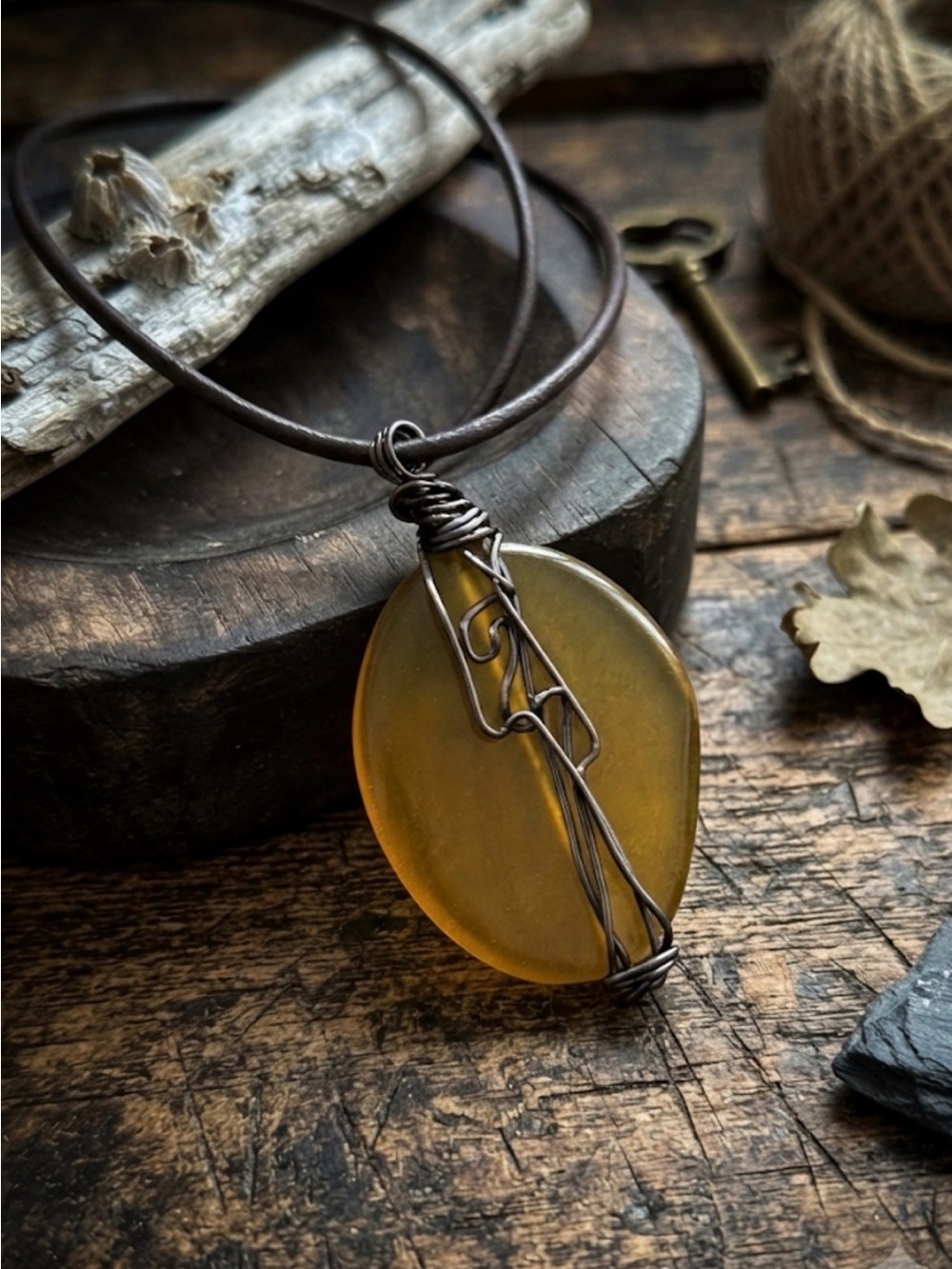 Artisan Amber Glass Pendant Necklace with Brown Wire Wrap